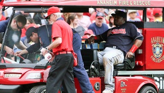 Next Story Image: Indians' Uribe leaves on cart after low blow from grounder
